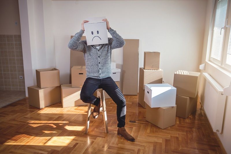 Man with box over his head